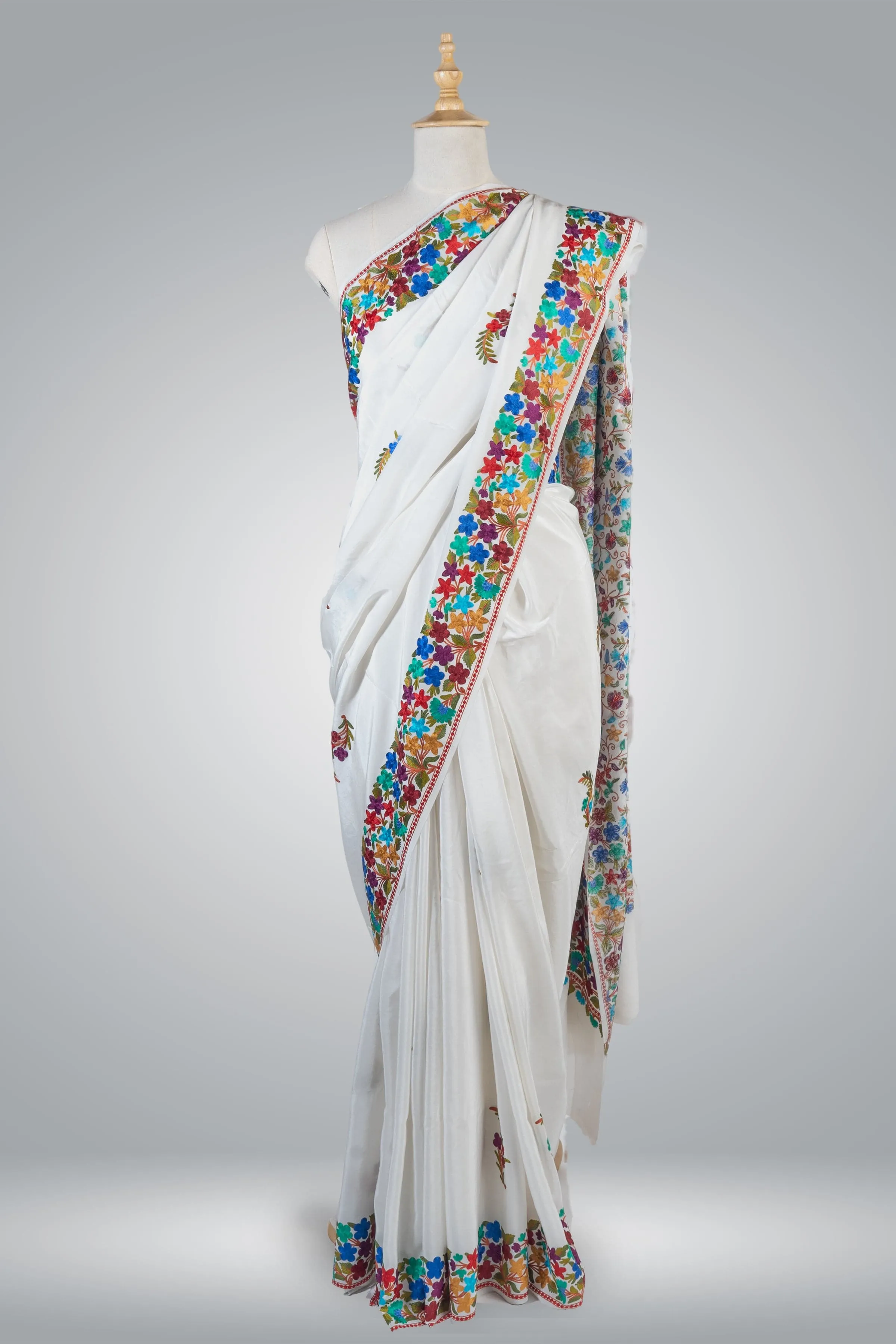Elegant White Pure Crepe Saree with Multicolor Aari Embroidery